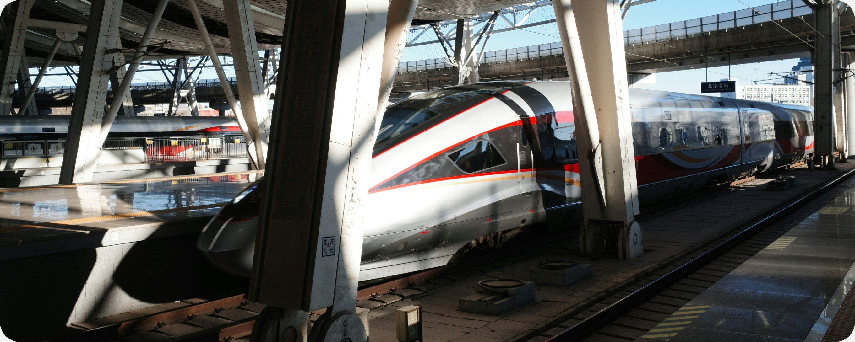 High-speed train arriving at a Japanese station